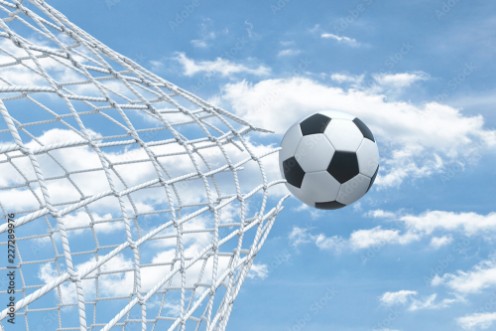 Picture of 3d rendering of a football ball flying away from inside the gate net and tearing it